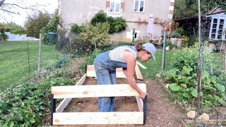 Inis Moestuin 34  Verhoogde moestuinbak maken en knoflook planten [upl. by Cogen]