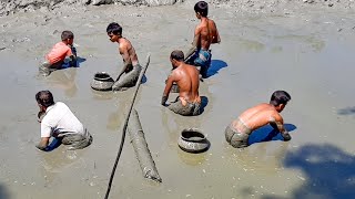 Amazing video of fishing by hand in winter day  Catfish catching by hand [upl. by Suivatnom183]