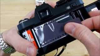 How To Load 35mm Film Konica Autoreflex TC [upl. by Evey]