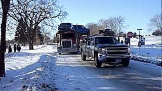 Chevy Silverado DMAX pulling a jackknifed SemiTrailer hauling cars out of a ditch [upl. by Lauralee]