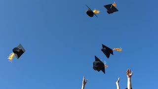 tossing graduation caps slow motion Graduación video [upl. by Howenstein173]