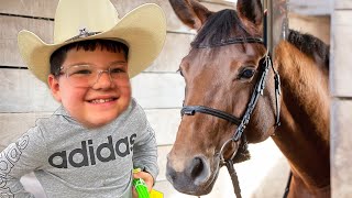 Caleb RIDES A HORSE Caleb GOES HORSEBACK RIDING WITH MOM and DAD [upl. by Hearsh873]