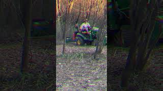 Using the Woodmaxx Flail Mower FM54 clear tree line johndeere1025r flailmower woodmaxx [upl. by Ecyt868]