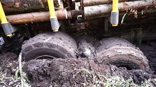 Valtra T144 with large trailer Kronos 160 4WDM logging in wet forest stuck in the mud [upl. by Ayoral618]