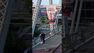 Jon Bon Jovi helps talk woman off pedestrian bridge ledge while shooting music video [upl. by Anier623]