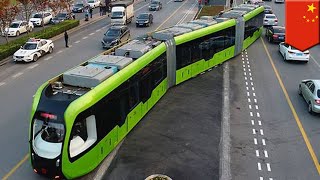 Smart train Worlds first trackless smart train begins test run in China  TomoNews [upl. by Nigam]