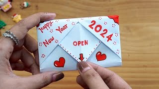 Easy amp Beautiful Happy New Year Card 2024  How to make new year greeting card [upl. by Hew]