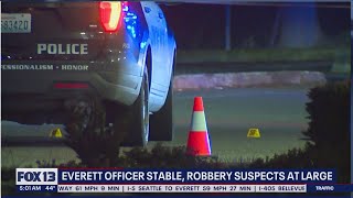 Everett officer stable after shooting robbery suspects remain at large  FOX 13 Seattle [upl. by Peednus]