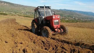 Tractor romanesc 4x4 Turbo Ploughing up hill [upl. by Wenz]