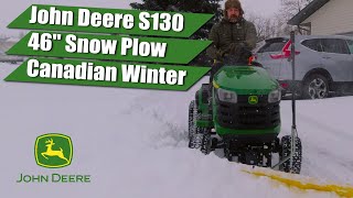 John Deere S130 Tractor with Snow Plow Pushing Snow [upl. by Acim]