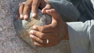 Grinding granite with a dolerite stone ball at the Unfinished Obelisk in Aswan Egypt [upl. by Anaihsat]