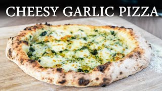 How To Make Cheesy Garlic Pizza Bread In A Pizza Oven  Roccbox Pizza Oven Recipes [upl. by Seena122]