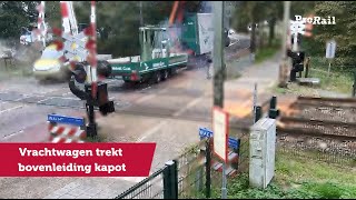 Vrachtwagen rijdt bovenleiding kapot bij overweg Vught  ProRail [upl. by Naugan]