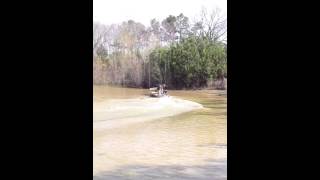 65 HP Long Tail on 14 Foot Jon Boat w One Person [upl. by Refinne]