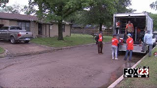 Video Community comes together to clean debris in Bartlesville after tornado [upl. by Gipsy]