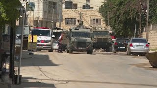 Israeli forces launch a large operation in the occupied West Bank AP explains whats behind it [upl. by Nylirahs]