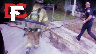 Firefighters Rescue Victim from Burning Home [upl. by Ellednahs]