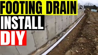 Installing footing drains TriCounty Excavating Dirt Boss [upl. by Eciral208]