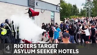 Rioters attack hotel housing asylum seekers amid farright violence [upl. by Osanna910]