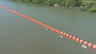 Judge orders Texas to move large floating barrier to riverbank by Sept 15 [upl. by Helbona]