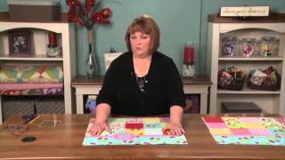 How to Make a Tote Bag Using Charm Packs  National Quilters Circle [upl. by Ennaoj]