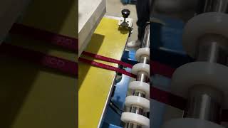 Automatic elastic tape embossing machine for logo deboss [upl. by Noyart670]