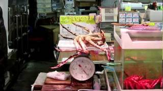 Buying crabs in Otaru seafood market [upl. by Nyleimaj44]