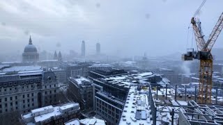 Timelapse Snow storm swallows up London skyline [upl. by Brena]