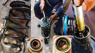 how to oil shock rebuild  Corolla cars shock [upl. by Annuahsal703]