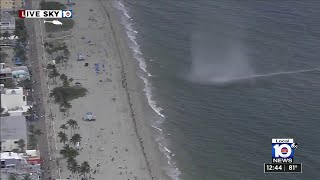 Waterspout comes ashore as tornado on Hollywood Beach [upl. by Maxy]