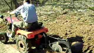 simplicity allis chalmers garden tractor plowing [upl. by Dnalel]