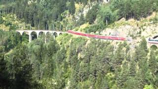 The Bernina Express crossing the Landwasser Viaduct near Filisur [upl. by Nilkoorb507]