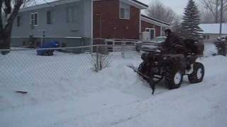 Yamaha Grizzly 700 plowing with 60 inch Warn Provantage Plow [upl. by Mikel]