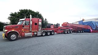 Trans American Peterbilt 567 Hauling Stator Gross 487000 Lbs 23 Axles 235 ft Long Kenworth Pusher [upl. by Refeinnej180]