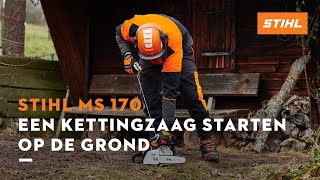 Een kettingzaag starten op de grond  STIHL MS 170 [upl. by Artiek671]