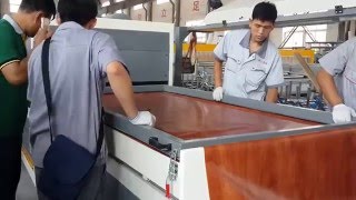 wpc door panel laminating machinelaminate film on door panel surface [upl. by Chader]