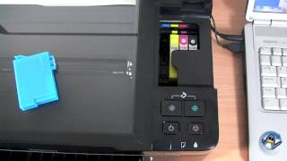 How to Change Ink Cartridges with a Epson Stylus SX125 [upl. by Latty]