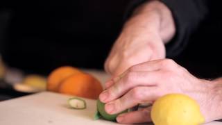 Cutting Lemons and Limes for the Bar  DrinkSkool Bar Techniques [upl. by Wyon406]