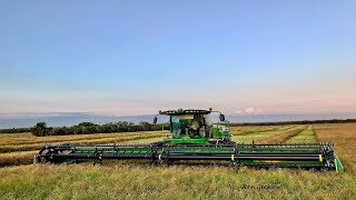 Swathing Canadian Canola with a John Deere W235 [upl. by Luzader491]