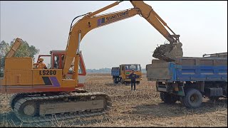 Sumitomo LS260 Excavator loading dump truck [upl. by Revlis]