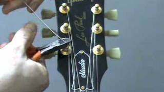 How to re string a guitar [upl. by Hugo]