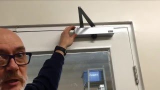 How To Adjust An Overhead Door Closer [upl. by Ainnat]