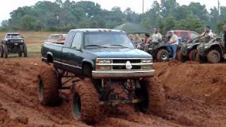 MUD TRUCKS Chevy Silverado on 54quot BOGGERS MUD BOGGIN [upl. by Narbig473]