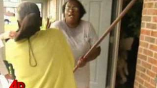 Raw Video Woman Attacks TV Crew With Hoe [upl. by Hurlbut]