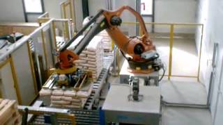 ROBOTEH palletizing solution  Wood pellet bags [upl. by Aloap]