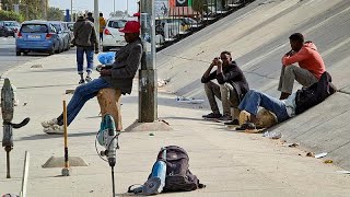 Facing a long and uncertain wait migrants work odd jobs in Libya [upl. by Gnidleif]