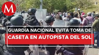 Guardia Nacional impide la toma de la caseta de Palo Blanco por normalista de Ayotzinapa [upl. by Eldnik]