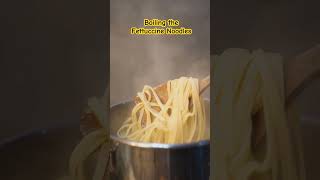 Cheesy Fettuccine Alfredo Pasta using handmade Fettuccine looks soo yumm 🍝 fettuccinealfredo [upl. by Aicekan340]