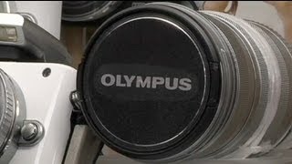 Olympus fraud arrests [upl. by Hamil]