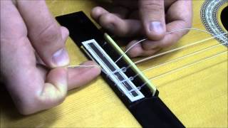 How To Restring a Classical Guitar [upl. by Ellerihs]